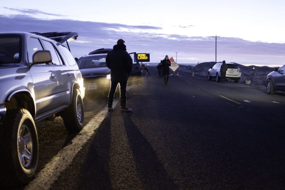 Media wait at a checkpoint about 4 miles from the Malheur Wildlife Refuge Headquarters near Burns, Oregon, on February 11, 2016.  
The FBI surrounded the last protesters holed up at a federal wildlife refuge in Oregon amid reports they will surrender on Thursday, suggesting the weeks-long armed siege is approaching a climax. (ROB KERR/AFP/Getty Images)