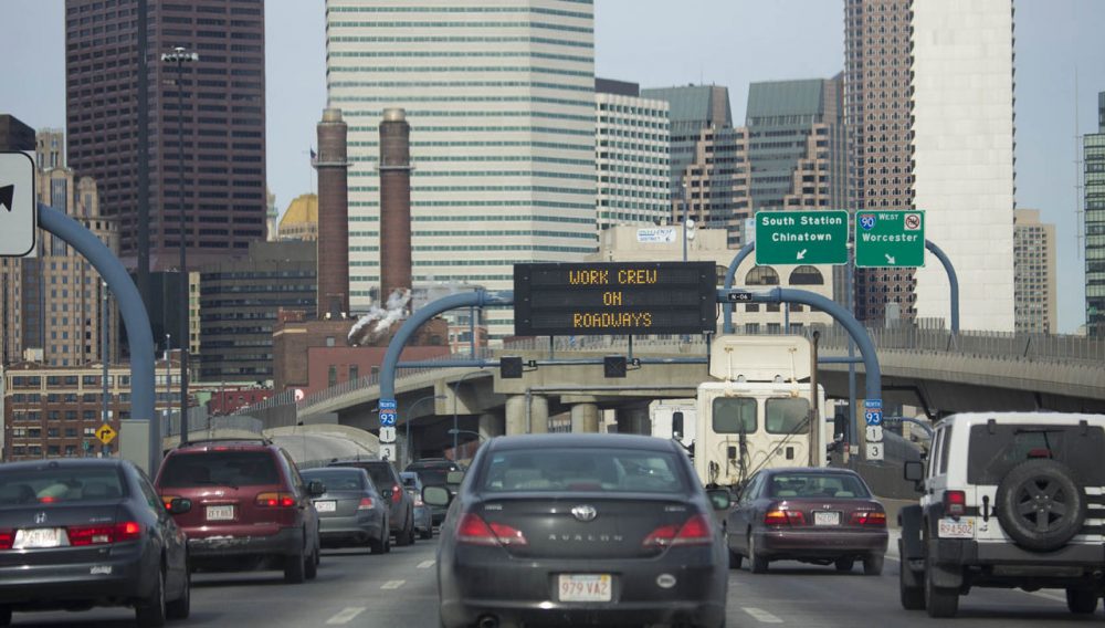 Signs alert drivers that workers are checking the infrastructure inside the O'Neill Tunnel after an accident Friday morning where a metal manhole cover on the roadway became dislodged, flew through a windshield and killed a driver. (Jesse Costa/WBUR)