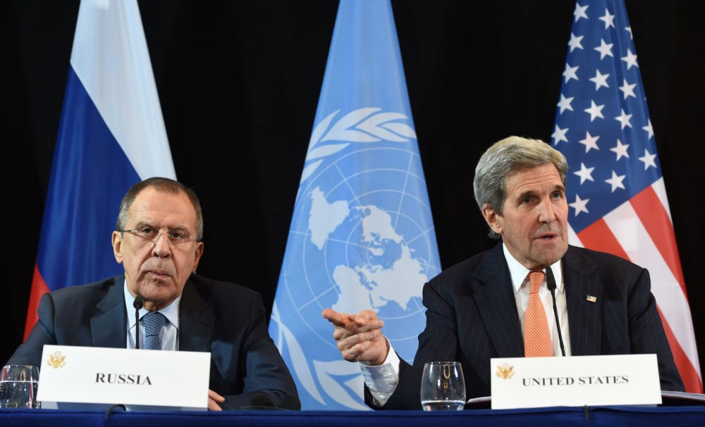 U.S. Secretary of State John Kerry (right) gestures beside Russian Foreign Minister Sergei Lavrov during a news conference after the International Syria Support Group (ISSG) meeting in Munich, Germany, on February 12, 2016.  (Christof Stache/AFP/Getty Images)