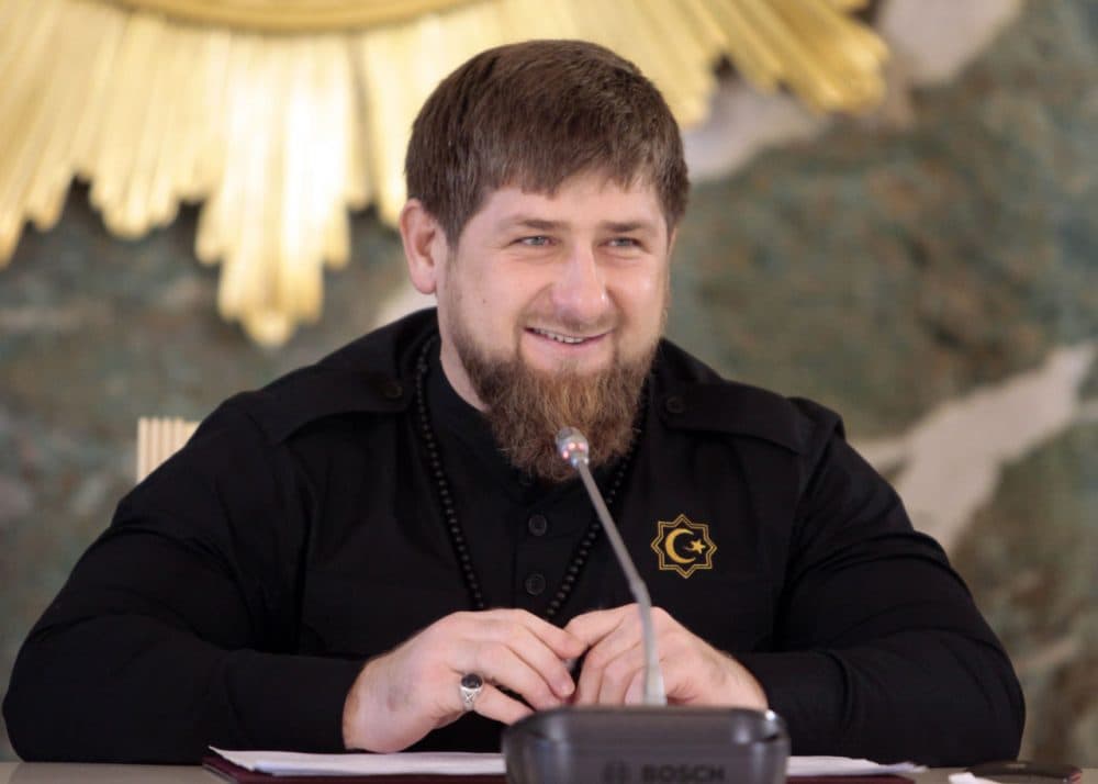 Chechen regional leader Ramzan Kadyrov speaks to journalists in Chechnya's provincial capital Grozny, Russia, Dec.  28, 2015. Russian investigators are expected to indict five men with the murder of opposition leader Boris Nemtsov, a brazen killing which sent shockwaves among the opposition earlier this year. Nemtsov, a top opponent of Russian President Vladimir Putin, was shot late at night on Feb. 27 as he was walking just outside the Kremlin. Five Chechen men have been arrested on charges of involvement in the killing, but it has remained unclear who ordered the attack. The key suspect in Nemtsov's killing was a senior officer in the security forces of Chechen leader Ramzan Kadyrov while the organizer named by the investigators was a personal driver of senior commander and Kadyrov ally Ruslan Geremeyev. (Musa Sadulaayev/AP)