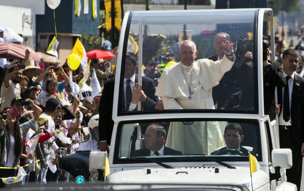 Pope Francis waves to the faithful upon his arrival in Morelia, Michoacán, on February 16, 2016.  Pope Francis arrived in Mexico's troublesome western state of Michoacan, where the cult-like Knights Templar drug cartel and its pseudo-messianic leader terrorized the population until farmers revolted against them. (Enrique Castro/AFP/Getty Images)