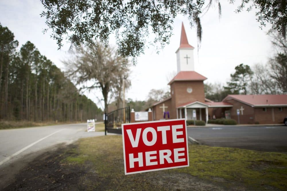 A &quot;Vote Here&quot; sign is positioned outside the Aimwell Presbyterian Church polling precinct on February 20, 2016 in Walterboro, South Carolina. (Mark Makela/Getty Images)