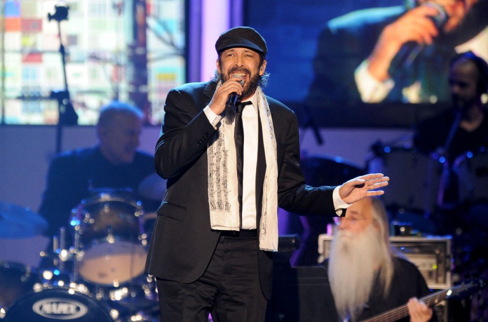 Juan Luis Guerra performs &quot;Lindeza&quot; at the 2012 Latin Recording Academy Person of the Year Tribute to Caetano Veloso at the MGM Grand Garden Arena on Wednesday, Nov. 14, 2012, in Las Vegas. (Powers Imagery/Invision/AP)