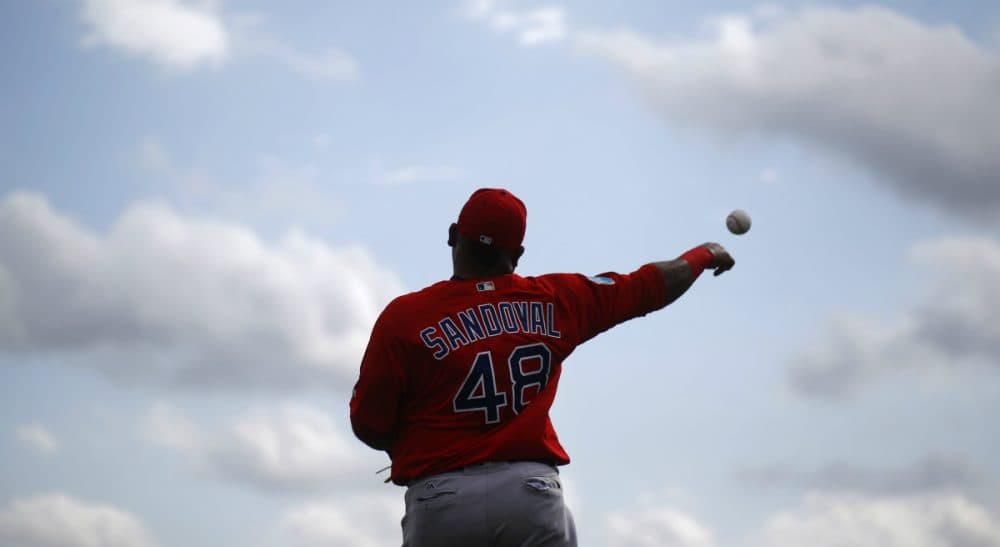 Boston Red Sox third baseman Pablo Sandoval throws a ball during a spring training baseball workout in Fort Myers, Fla., Wednesday, Feb. 24, 2016. (Patrick Semansky/AP)