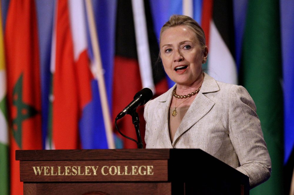 Then-Secretary of State Hillary Clinton speaks at her alma mater, Wellesley College, in this 2012 file photo. In 2016, the school is split on supporting Clinton and her rival for the Democratic presidential nomination, Bernie Sanders. (Stephan Savoia/AP)