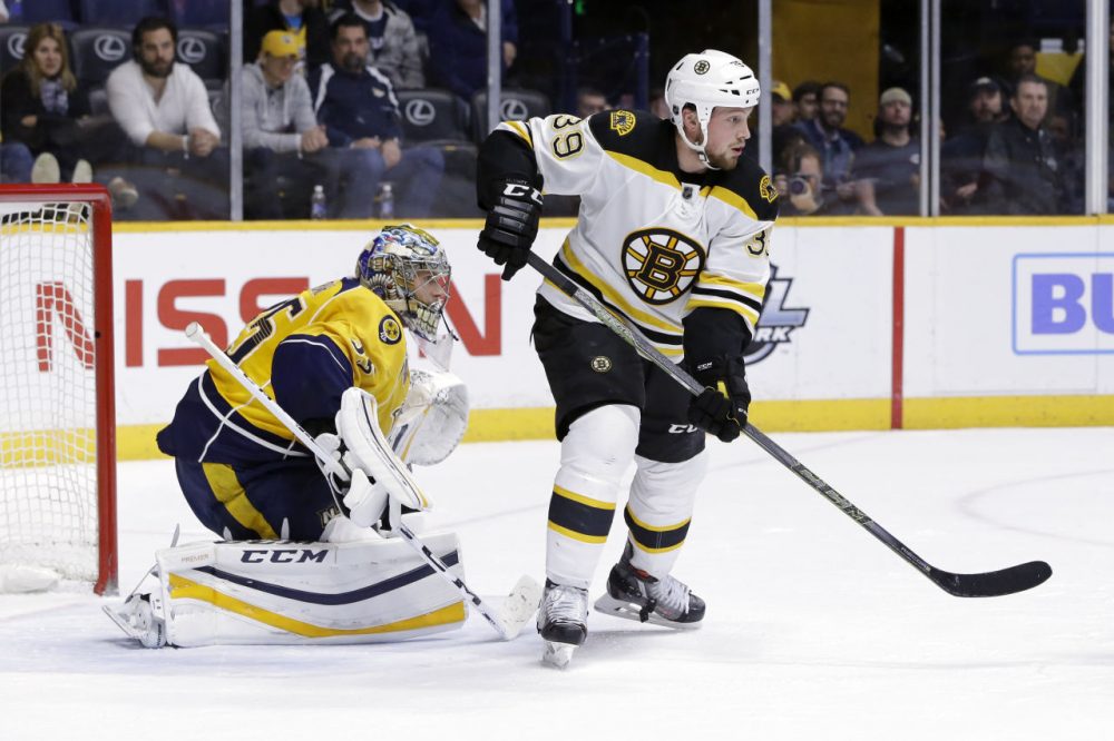 Bruins left wing Matt Beleskey (39) and Nashville Predators goalie Pekka Rinne (35), of Finland, play in Thursday's game in Nashville, Tennessee. (Mark Humphrey/AP)