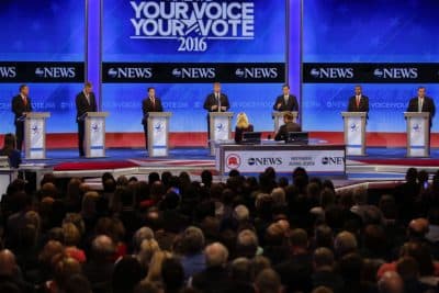 Republican presidential candidates line up on stage at the beginning of a debate hosted by ABC News at St. Anselm College  Saturday in Manchester. (David Goldman/AP)