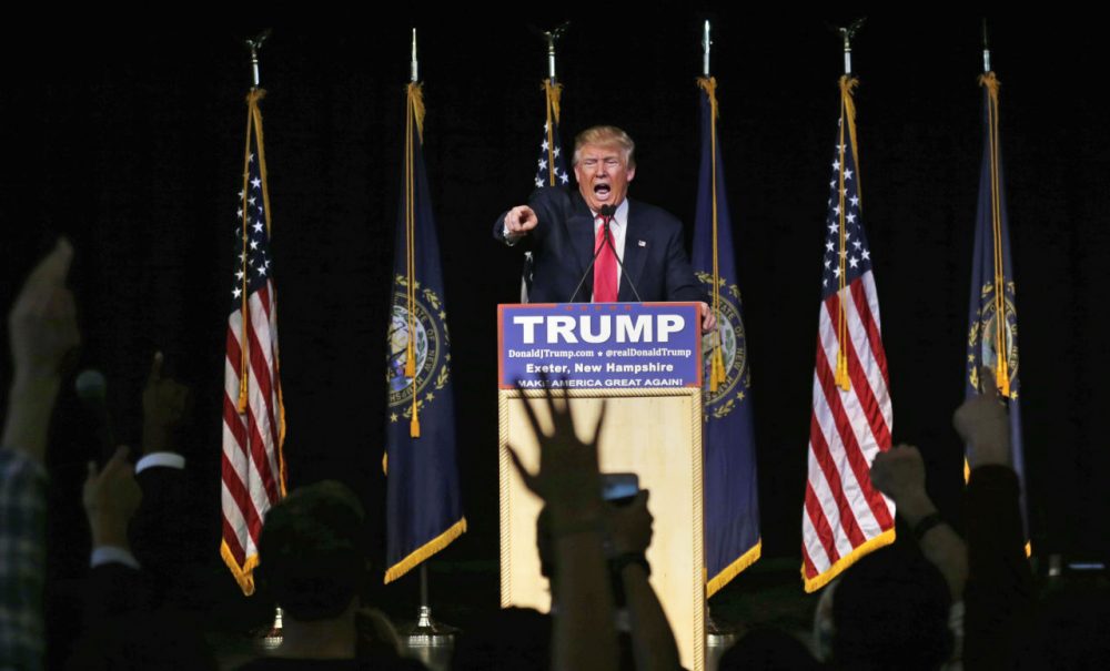 Republican presidential candidate Donald Trump takes questions during a campaign stop at Exeter Town Hall in Exeter, N.H., Thursday, Feb. 4, 2016. (AP Photo/Charles Krupa)