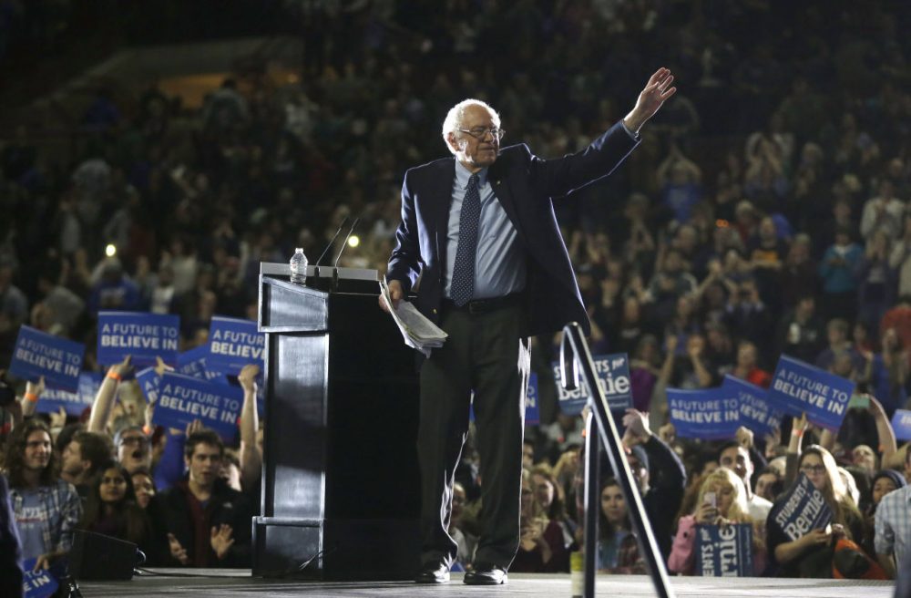 Democratic presidential candidate Bernie Sanders waves to the crowd at the conclusion of a campaign rally Monday in Amherst. (Steven Senne/AP)