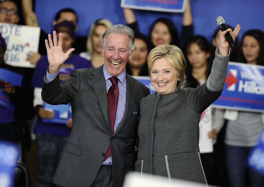 Democratic presidential candidate Hillary Clinton and Rep. Richard Neal, D-Mass. wave during a campaign event, Monday in Springfield, Mass. (AP Photo/Jessica Hill)