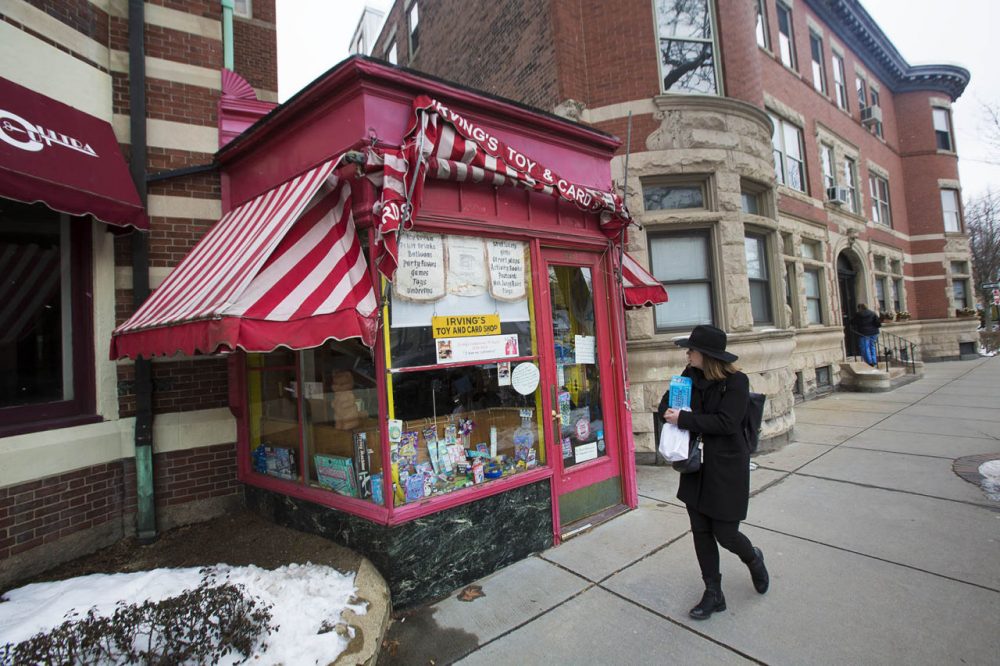 Since being closed in December, Irving's Toy Shop is beginning to look decrepit as the awning is damaged and is tied up with twine after a couple of winter storms. (Jesse Costa/WBUR)
