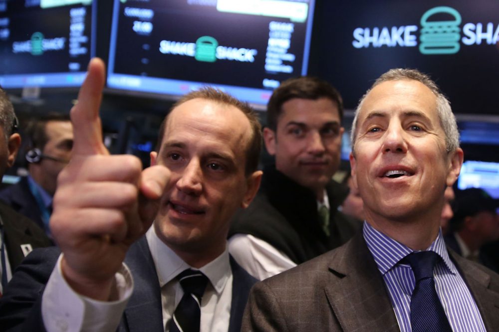 CEO of Shake Shack Randy Garutti (Left) and founder and Chairman Danny Meyer visit the floor of the New York Stock Exchange (NYSE) on January 30, 2015 in New York City. Hamburger chain Shake Shack rose more than 130 percent in its trading debut on the NYSE Friday. Shares for the New York based burger chain opened at $47 and quickly climbed above $52 before dipping back to $48.77 for a 132 percent advance.  (Spencer Platt/Getty Images)