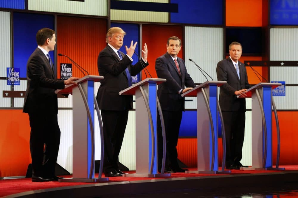 Republican presidential candidate, businessman Donald Trump, second from left, talks about his hand size at the Republican presidential primary debate at Fox Theatre, Thursday, March 3, 2016, in Detroit. &quot;And [Marco Rubio] referred to my hands – 'if they're small, something else must be small.' I guarantee you there's no problem. I guarantee,&quot; Trump said. (Paul Sancya/AP)