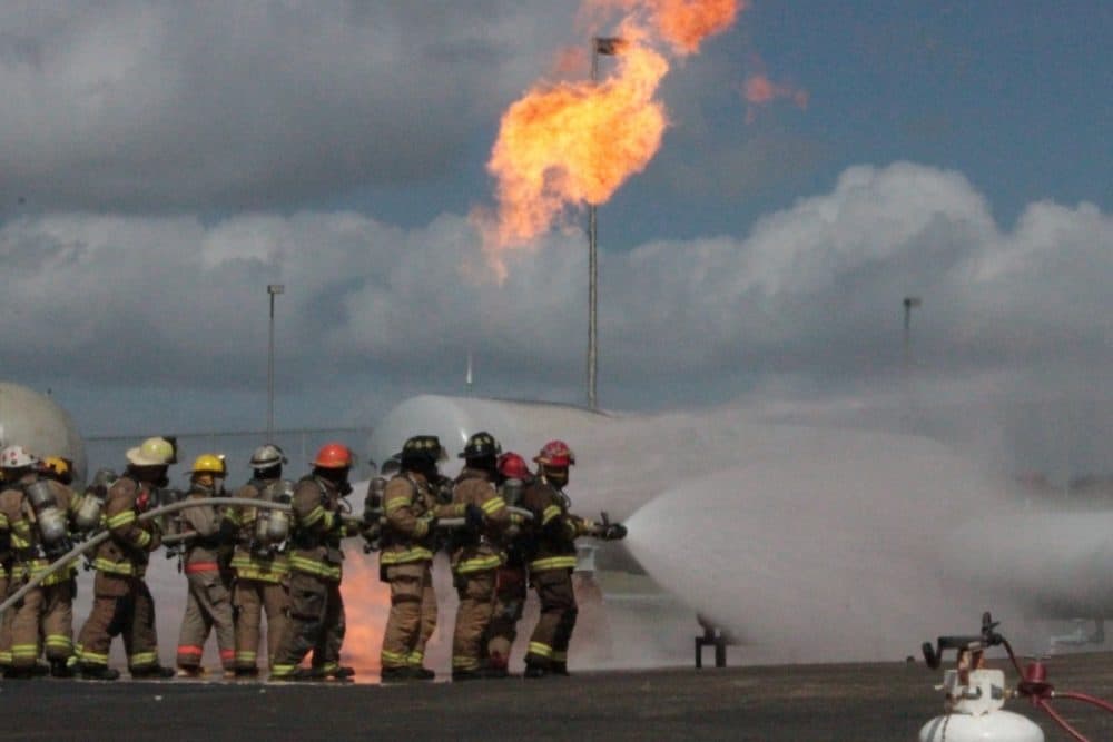 Volunteer firefighters training at Texas A&amp;M’s Disaster City in College Station. (Dave Fehling/Houston Public Media)