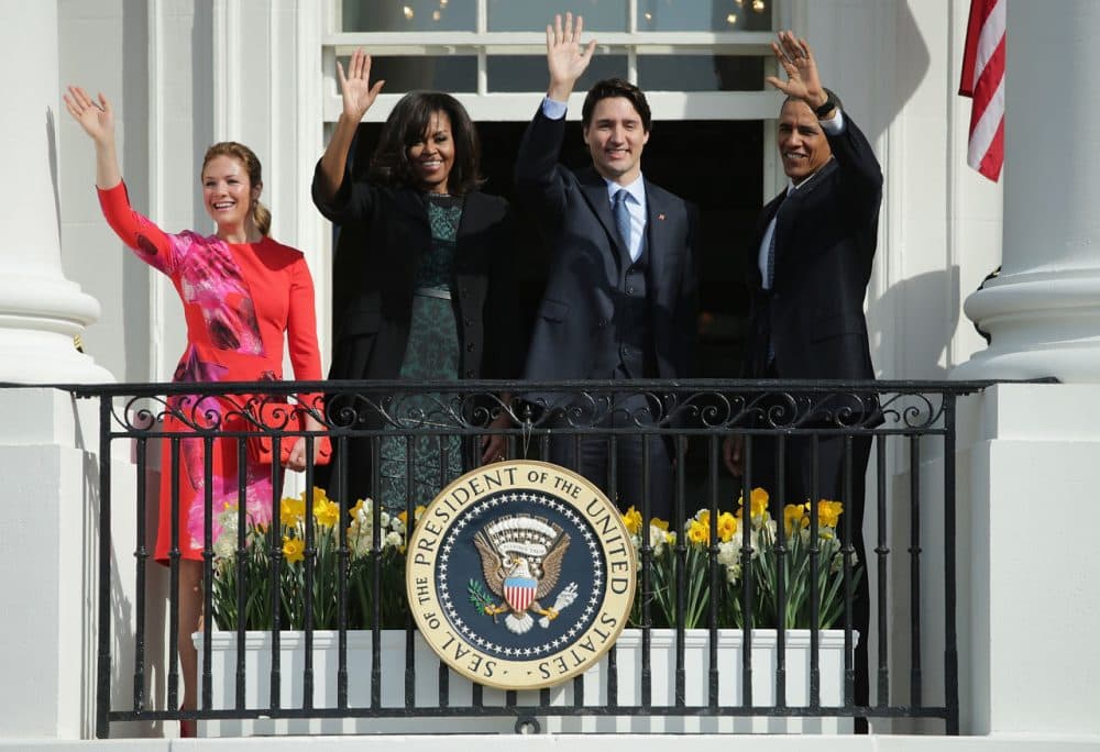 U.S. President Barack Obama (R) and Canadian Prime Minister Justin Trudeau (2nd R), U.S. first lady Michelle Obama (2nd L) and Sophie Grégoire-Trudeau (L) wave to invited guests from the Truman Balcony of the White House after an arrival ceremony at the White House, March 10, 2016 in Washington, DC. This is Trudeau's first trip to Washington since becoming Prime Minister. (Chip Somodevilla/Getty Images)