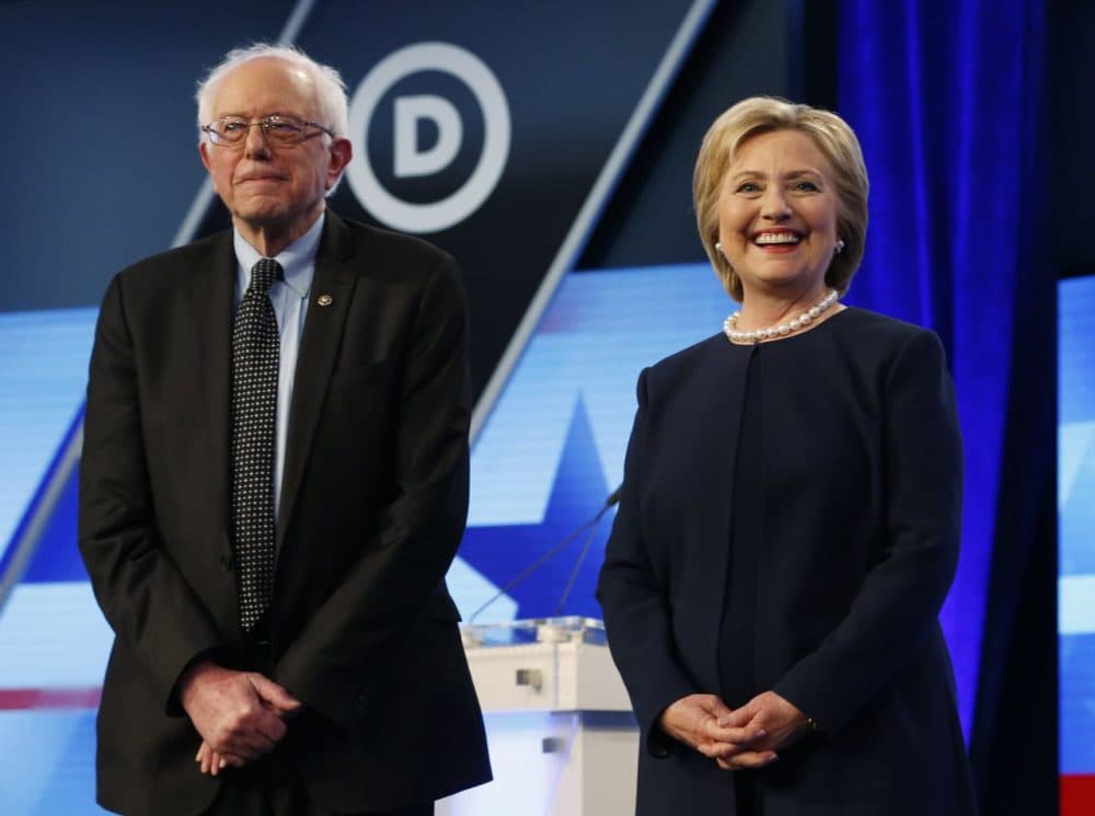 Democratic presidential candidates, Hillary Clinton and Sen. Bernie Sanders, I-Vt,  stand together before the start of the Univision, Washington Post Democratic presidential debate at Miami-Dade College,  Wednesday, March 9, 2016, in Miami, Fla. (Wilfredo Lee/AP)