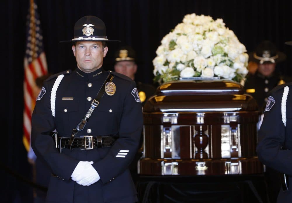 Simi Valley police stand guard as people pay their respects as former first lady Nancy Reagan lies in repose at the Ronald Reagan Presidential Library March 10, 2016 in Simi Valley, California. Reagan died of heart failure at the age of 94. (Mike Blake/Getty Images)
