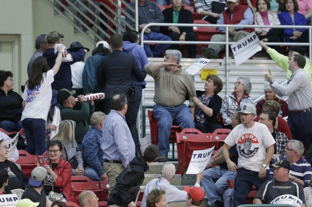A protester is removed from Republican presidential candidate Donald Trump's campaign rally in Concord, N.C., Monday, March 7, 2016. (Gerry Broome/AP)