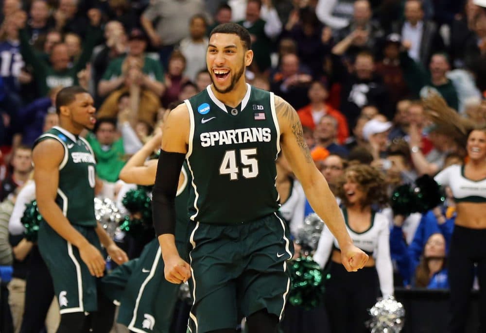 Andy Bottoms admits that he's far better at predicting the NCAA Tournament field rather the eventual champion. Still, he's picking Denzel Valentine and Michigan State. (Elsa/Getty Images)