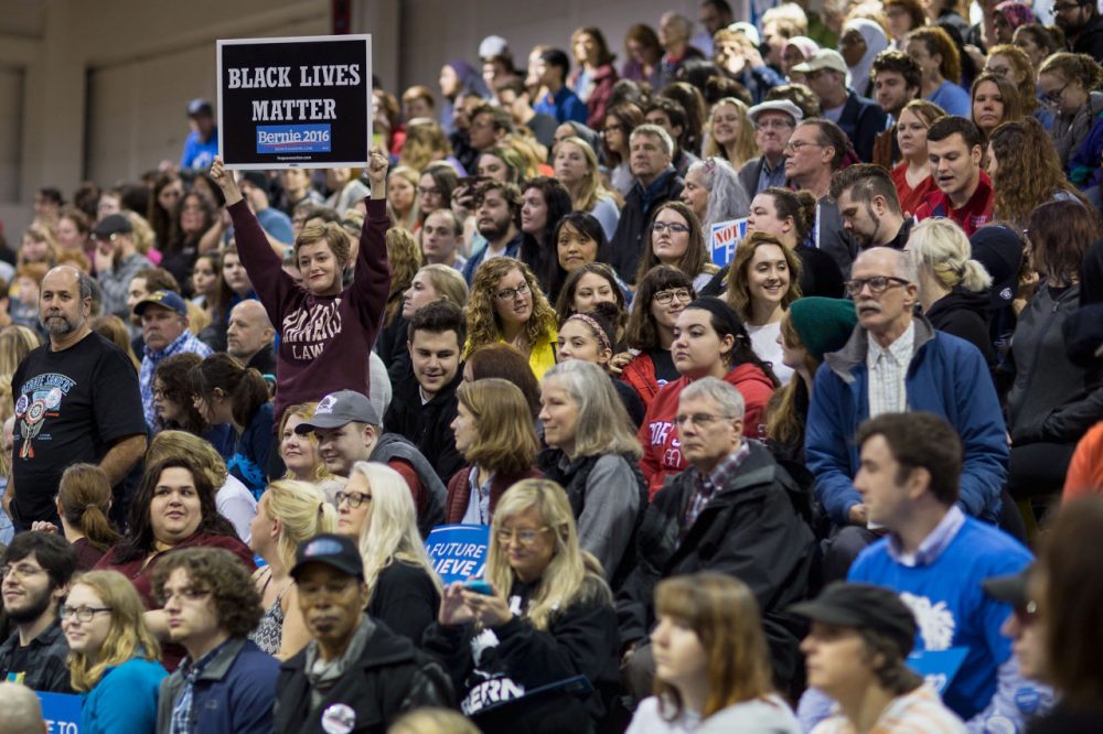 People wait for the arrival of Democratic presidential candidate Bernie Sanders at a campaign rally at Affton High School on March 13, 2016 in St Louis, Missouri. Sanders was campaigning ahead of the Missouri primary on March 15. (Whitney Curtis/Getty Images)