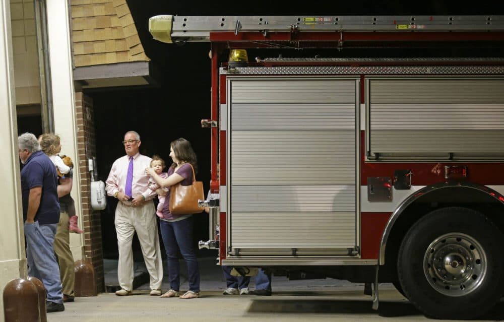 Voters line up to cast their ballots during the primary election at Cary Fire Station 9 in Cary, N.C., Tuesday, March 15, 2016. (AP Photo/Gerry Broome)