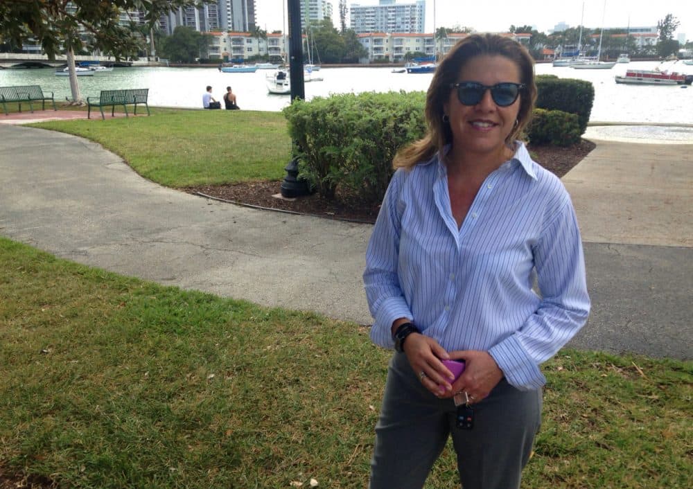 Susy Torriente is assistant city manager and chief resiliency officer in Miami Beach. She's pictured at a park that has seen an increase in flooding, which the city attributes to sea level rise and climate change. (Peter O'Dowd/Here & Now)