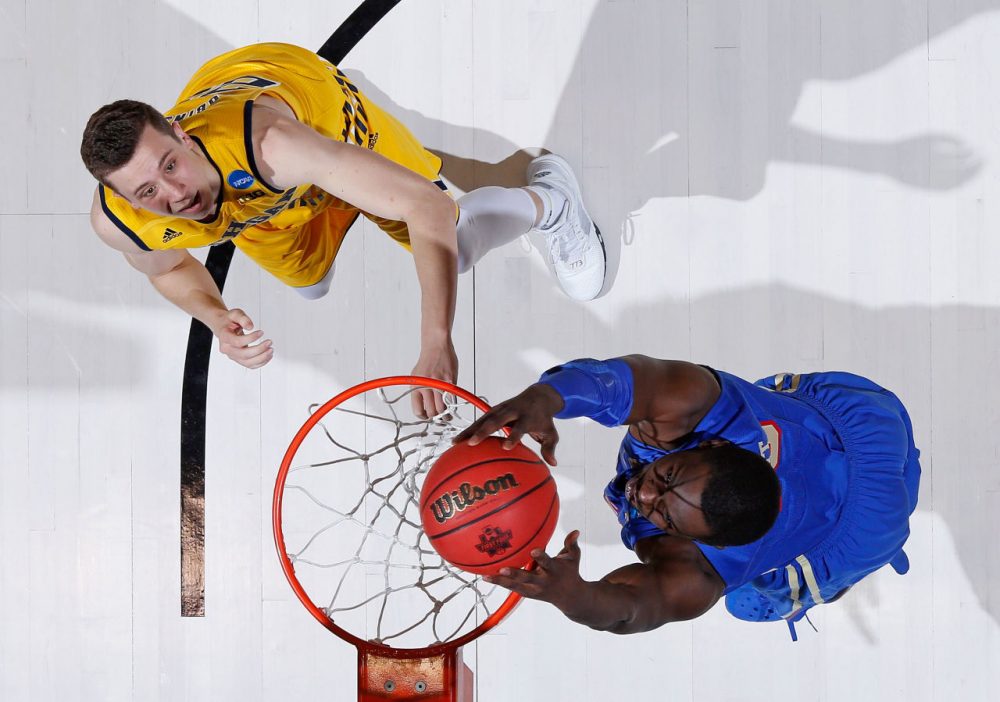 D'Andre Wright #40 of the Tulsa Golden Hurricane dunks against Sean Lonergan #20 of the Michigan Wolverines during the first round of the 2016 NCAA Men's Basketball Tournament at UD Arena on March 16, 2016 in Dayton, Ohio.  (Joe Robbins/Getty Images)