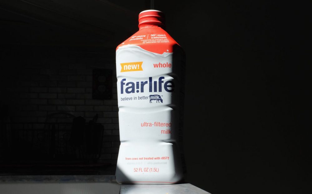In this photo illustration, a container of Coca-Cola Companies' new Fairlife milk is seen on February 4, 2015 in Miami, Florida.  The company announced it will be selling the milk which they say is specially cold-filtered so that it has 50% more protein, 50% less sugar and 30% more calcium than conventional milk.  (Joe Raedle/Getty Images)