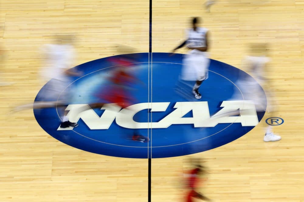 The NCAA refers to its players as &quot;student-athletes.&quot; Author Joe Nocera thinks that's a term that needs a closer look. (Mike Ehrmann/Getty Images)