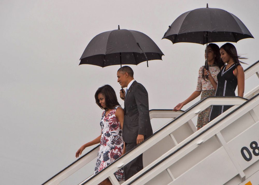 U.S. President Barack Obama, First Lady Michelle Obama and daughters Malia and Sasha disembark from Air Force One at the Jose Marti International Airport in Havana on March 20, 2016. Obama arrived in Cuba to bury the hatchet in a more than half-century-long Cold War conflict that turned the communist island and its giant neighbor into bitter enemies.     (Nicholas Kamm/AFP/Getty Images)