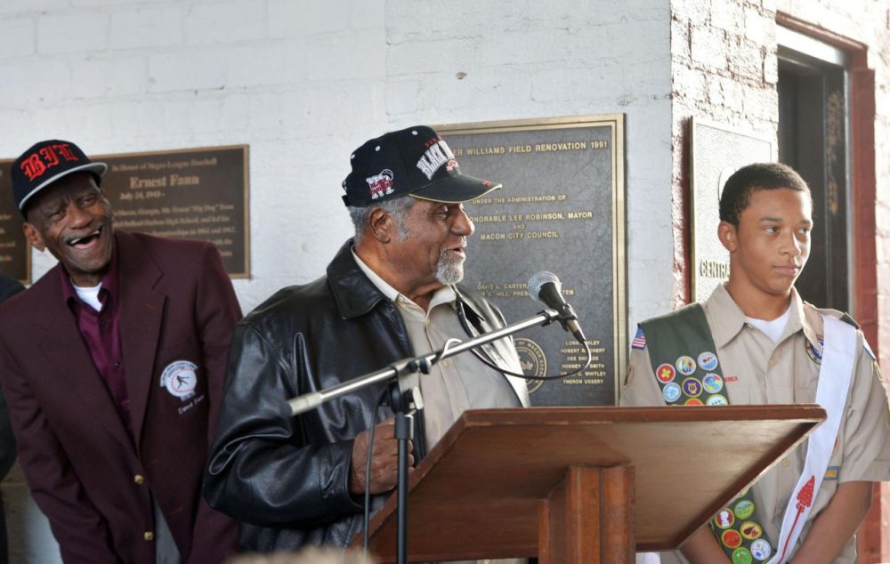 Eagle scout candidate Gordon Smith, right, is congratulated by two of the Negro League baseball players, Ernest Fann, left, and Robert Scott, center, he helped honor with plaques at Luther Williams Field Saturday in Macon, Georgia. (Beau Cabell/Telegraph of Macon)