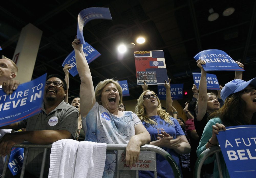 Members of the crowd show their support for Democratic presidential candidate Sen. Bernie Sanders (D-VT) at the Phoenix Convention Center during a campaign rally on March 15, 2016 in Phoenix, Arizona. (Ralph Freso/Getty Images)