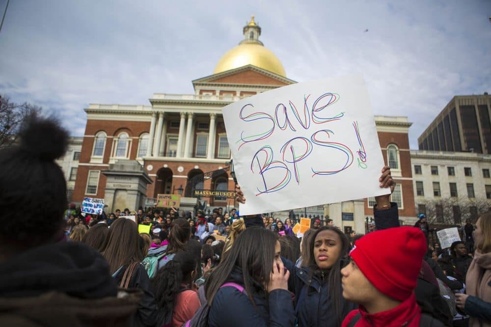 Boston Public School students rallying in front of the Statehouse. (Jesse Costa/WBUR)