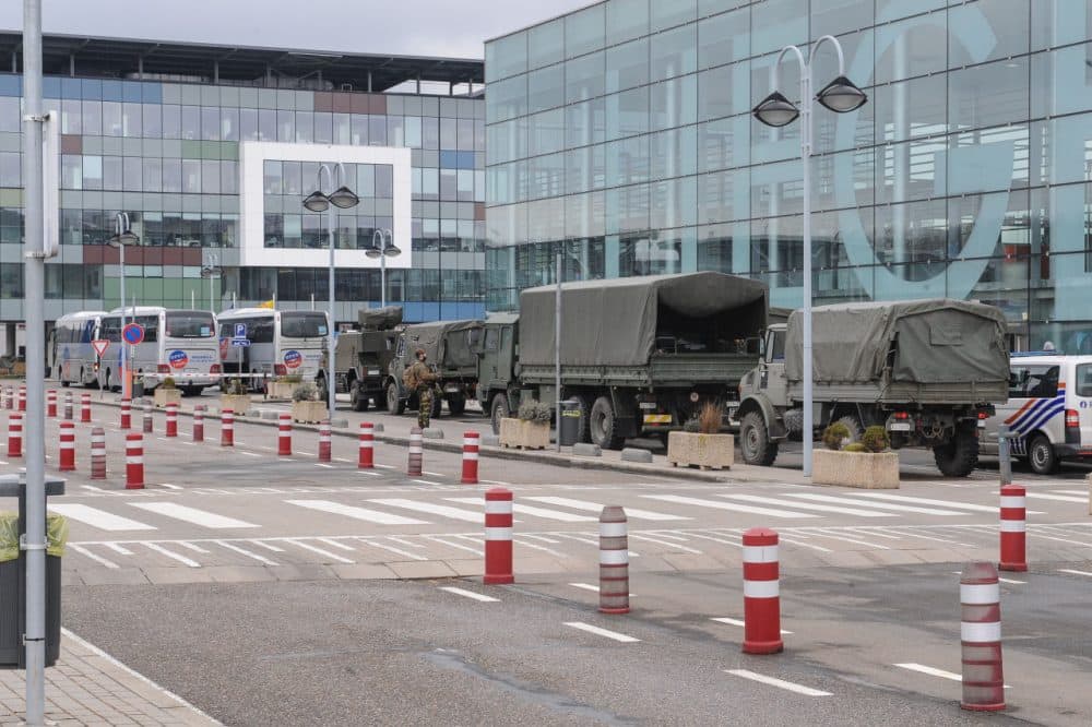 Military vehicles are parked outside Liege airport, on March 23, 2016, as extra security measures are being set one day after two massive suicide blasts by men with bombs in their bags hit the airport, leaving blood and mangled bodies strewn across the check-in hall and sending terrified travelers fleeing.
Bombings claimed by the Islamic State group at Brussels airport and on a metro train left around 35 people dead and more than 200 injured in the city that hosts NATO and EU headquarters. (SOPHIE KIP/AFP/Getty Images)