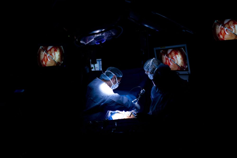 Dr. Dorry Segev performs arthroscopic surgery during a kidney transplant at Johns Hopkins Hospital June 26, 2012 in Baltimore, Maryland. The US Supreme Court is expected to announce their decision on the US President Barack Obama's healthcare law on June 28. (BRENDAN SMIALOWSKI/AFP/Getty Images)