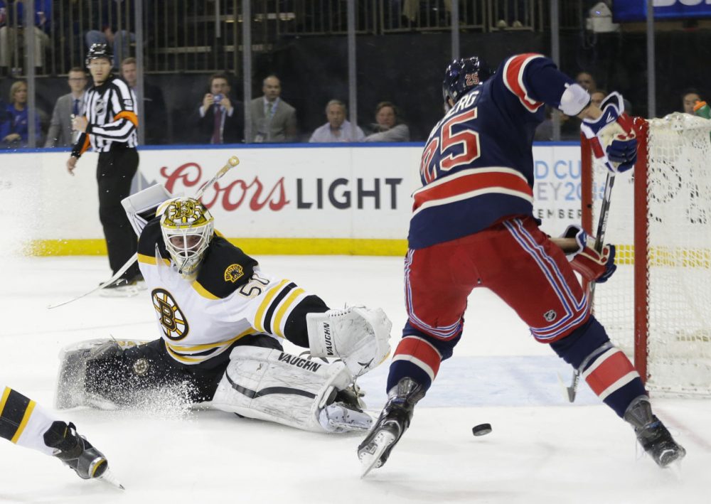 Boston Bruins goalie Jonas Gustavsson (50) deflects a shot by New York Rangers' Viktor Stalberg (25) during yesterday's game. (Frank Franklin II/AP)