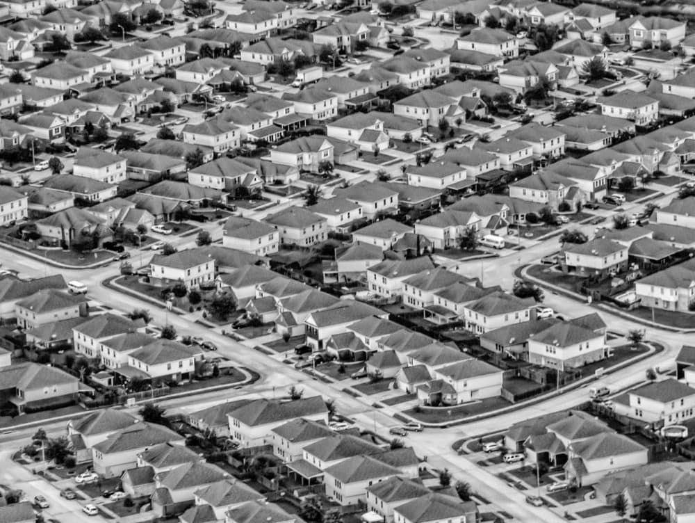 A bird's eye view of a suburban neighborhood, while approaching Houston International Airport. (Wayne S. Grazio/Flickr)