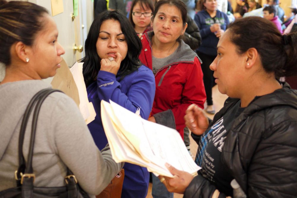 Waiting in line at Centro de la Raza in Seattle for a shot at 110 units of affordable housing. (Liz Jones/KUOW)