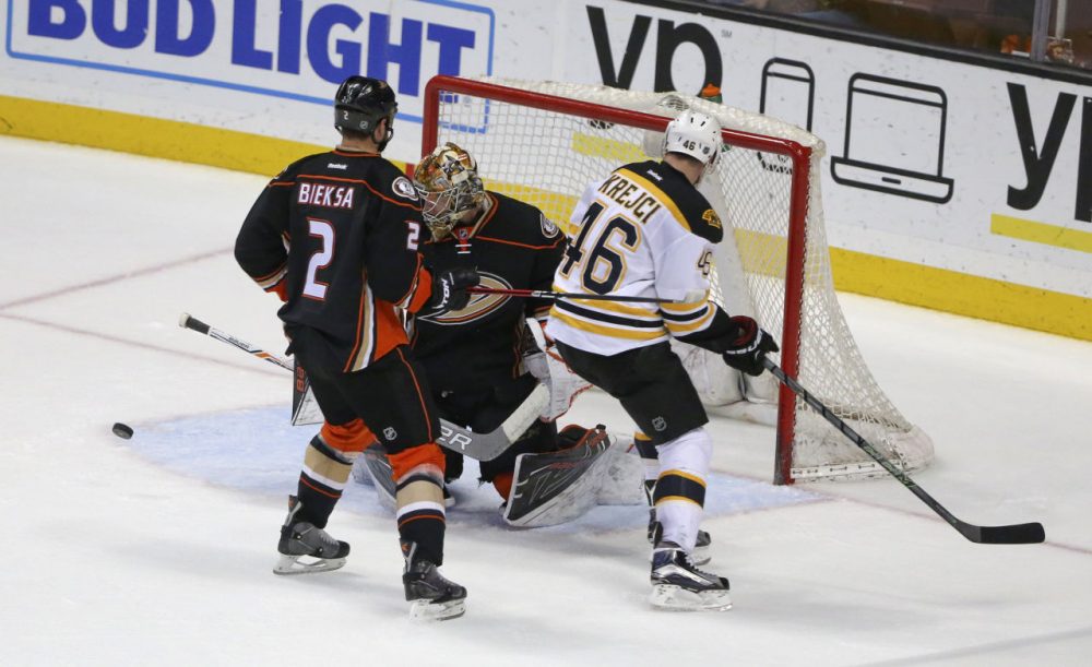 Anaheim Ducks goalie Frederik Andersen turns away a shot by Bruins center David Krejci during a game Friday, in Anaheim, California. (Lenny Ignelzi/AP)