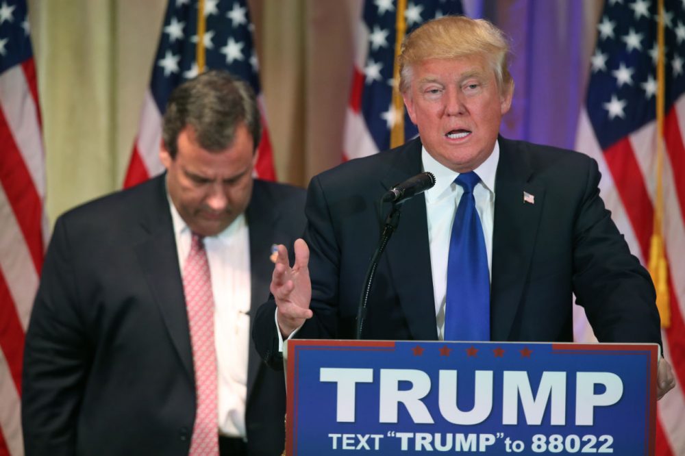 Republican presidential candidate Donald Trump speaks in Palm Beach Tuesday night, alongside former rival, New Jersey Gov. Chris Christie. (Andrew Harnik/AP)

