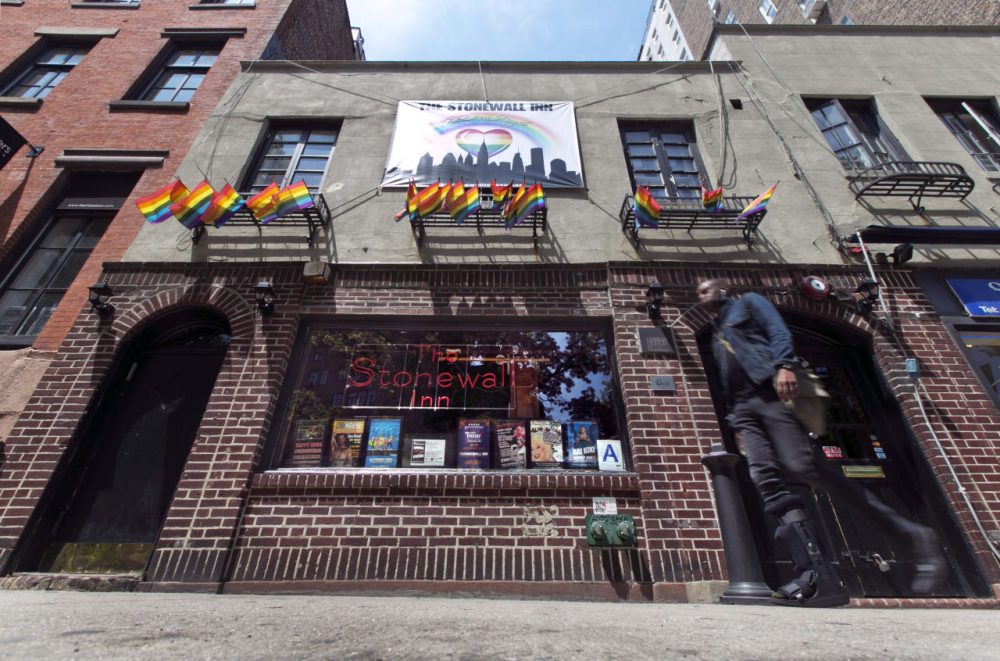FILE - This May 29, 2014 file photo shows The Stonewall Inn, in New York's Greenwich Village. New York City's landmarks commission voted Tuesday, June 23, 2013, to grant official status to the bar where resistance to a police raid sparked the modern gay rights movement. (AP Photo/Richard Drew, File)