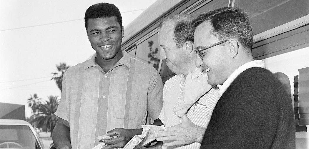 Bud Collins (center) with Muhammad Ali and Edwin Pope, assistant sports editor of the Miami Herald, in 1965. (AP)