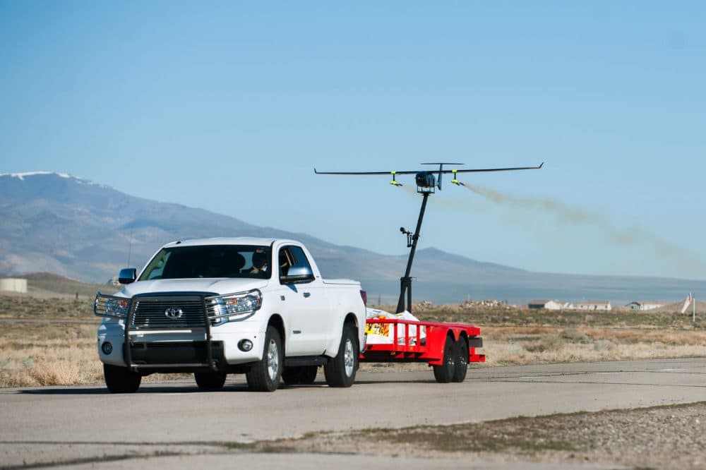 Drone America's Savant UAS is mounted with silver iodide flares in preparation for a joint cloud seeding test with the Desert Research Institute (DRI) in Fernley, Nevada, on Friday, March 18, 2016. (Kevin Clifford/Drone America)