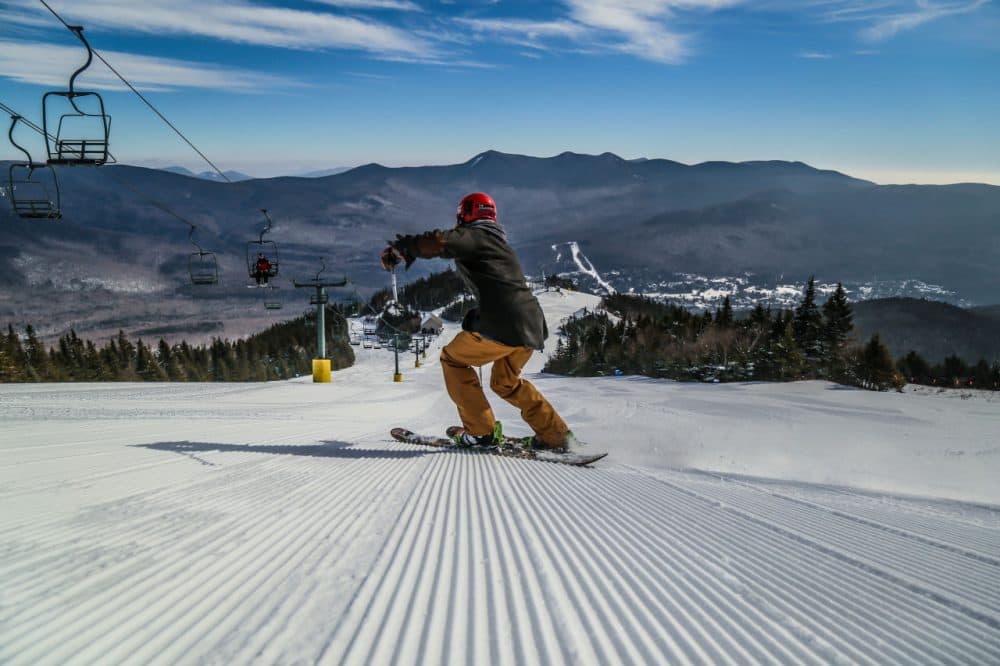 Record temperatures this week have plenty of people packing up their winter gear and looking ahead to spring. But New England ski mountains are hoping folks keep their ski and snowboard gear handy for at least a few more weeks. (Courtesy of Tyler Walker/Waterville Valley Resorts)