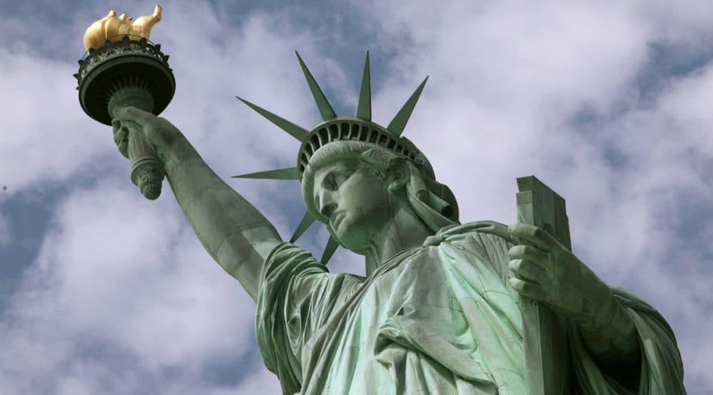 Eric Silverman: &quot;Woeful as it is, xenophobia is a time-honored American tradition. But so is the ideal of a more hospitable message.&quot; Pictured: 
The Statue of Liberty. (Richard Drew/AP)