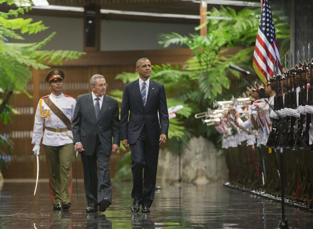 President Barack Obama and Cuban President Raul Castro walk during a welcoming ceremony at the Palace of the Revolution, Monday, March 21, 2016, in Havana, Cuba. (AP Photo/Pablo Martinez Monsivais)