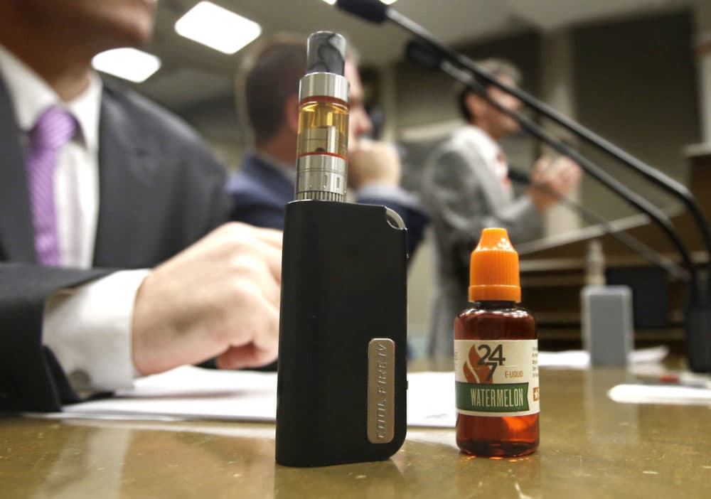 The new restrictions, which take effect Tuesday, are intended to address concerns children may swallow the liquids or gels, which contain a high concentration of nicotine. (Rich Pedroncelli/AP)