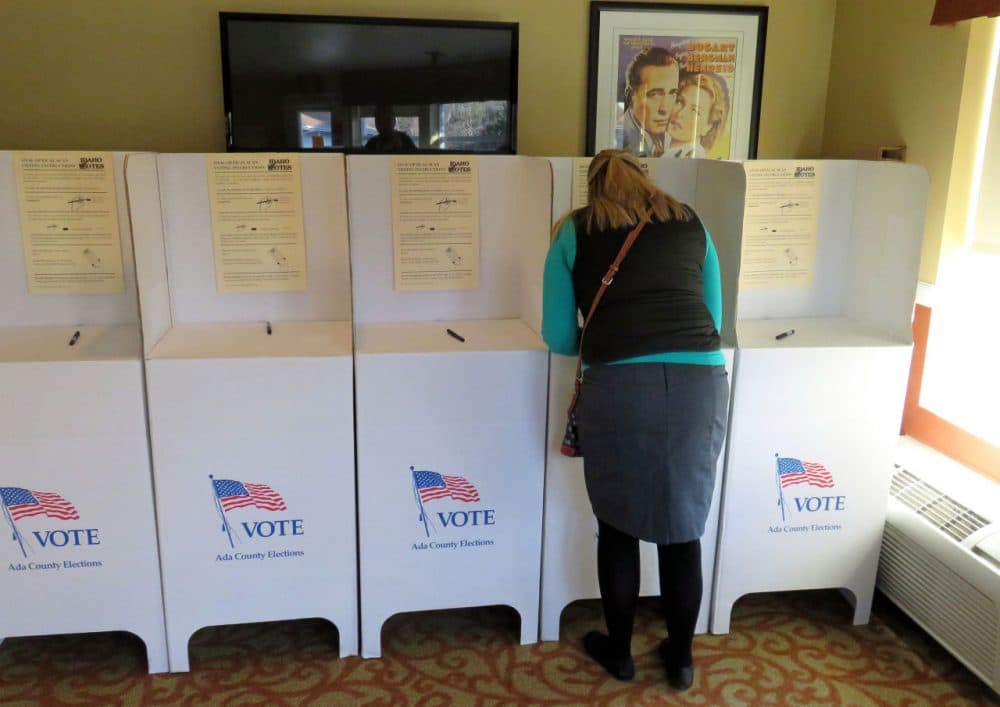 A voter fills out her ballot at the Brookdale Assisted Living Center on the east side of Boise, Idaho. (Tom Banse/Northwest News Network)