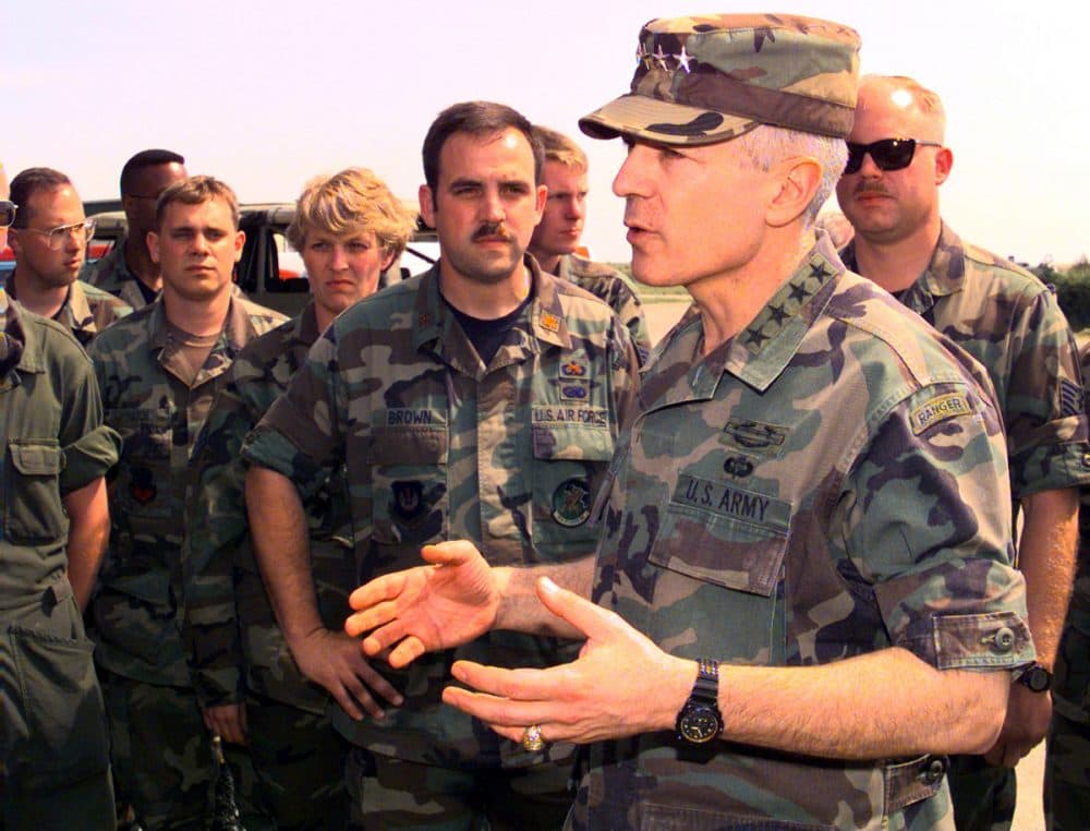 Retired Army General Wesley Clark was the NATO Supreme Allied Commander during the Kosovo War. He is pictured here speaking with U.S. Air Force members on May 13, 1999 at Gioia del Colle Air Base, Italy. The airmen are assigned to the 40th Air Expeditionary Group to support Operation Allied Force. ( Blake R. Borsic/USAF via Getty Images)