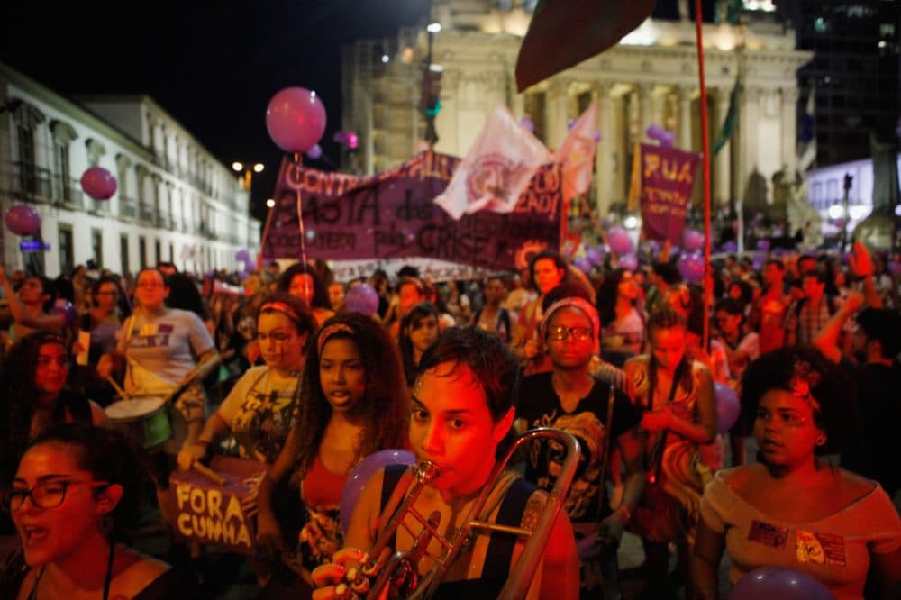 Activists march for women's rights on International Women's Day on March 8, 2016 in Rio de Janeiro, Brazil. Marchers called for myriad reforms including expanded female reproductive rights. Women's reproductive rights have taken on a new focus in Brazil following the onset of the Zika virus outbreak, which authorities strongly suspect is linked to birth defects. (Mario Tama/Getty Images)
